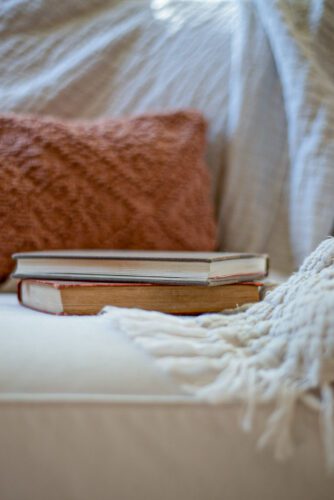 books on a couch